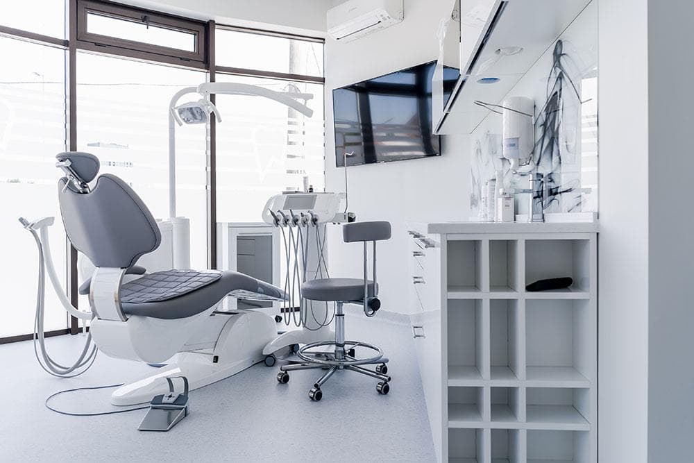 Modern dental operatory with contemporary equipment and chair
