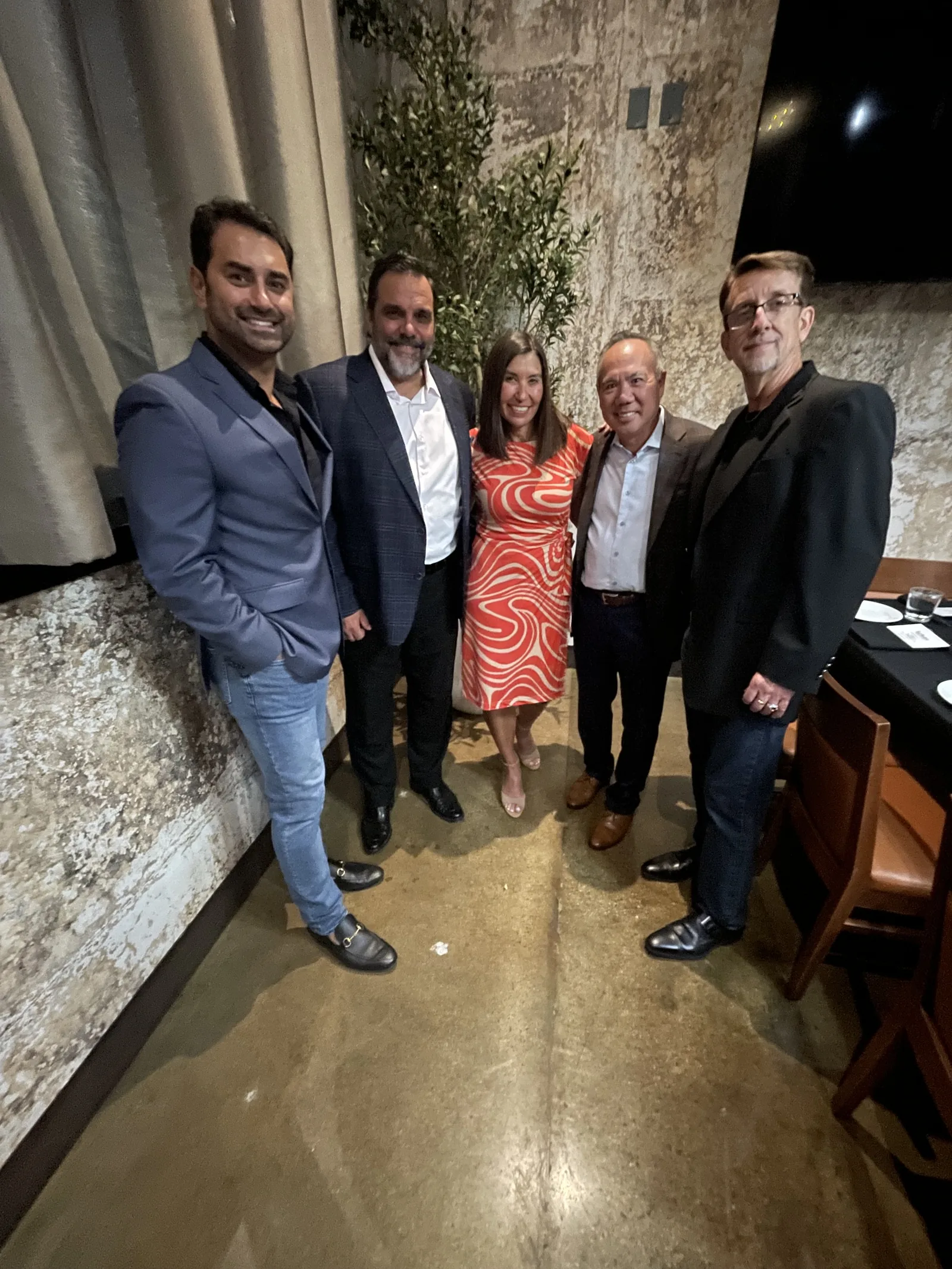 Dr. Michael Njo with dentists and referral partners at the Panel of Experts dinner