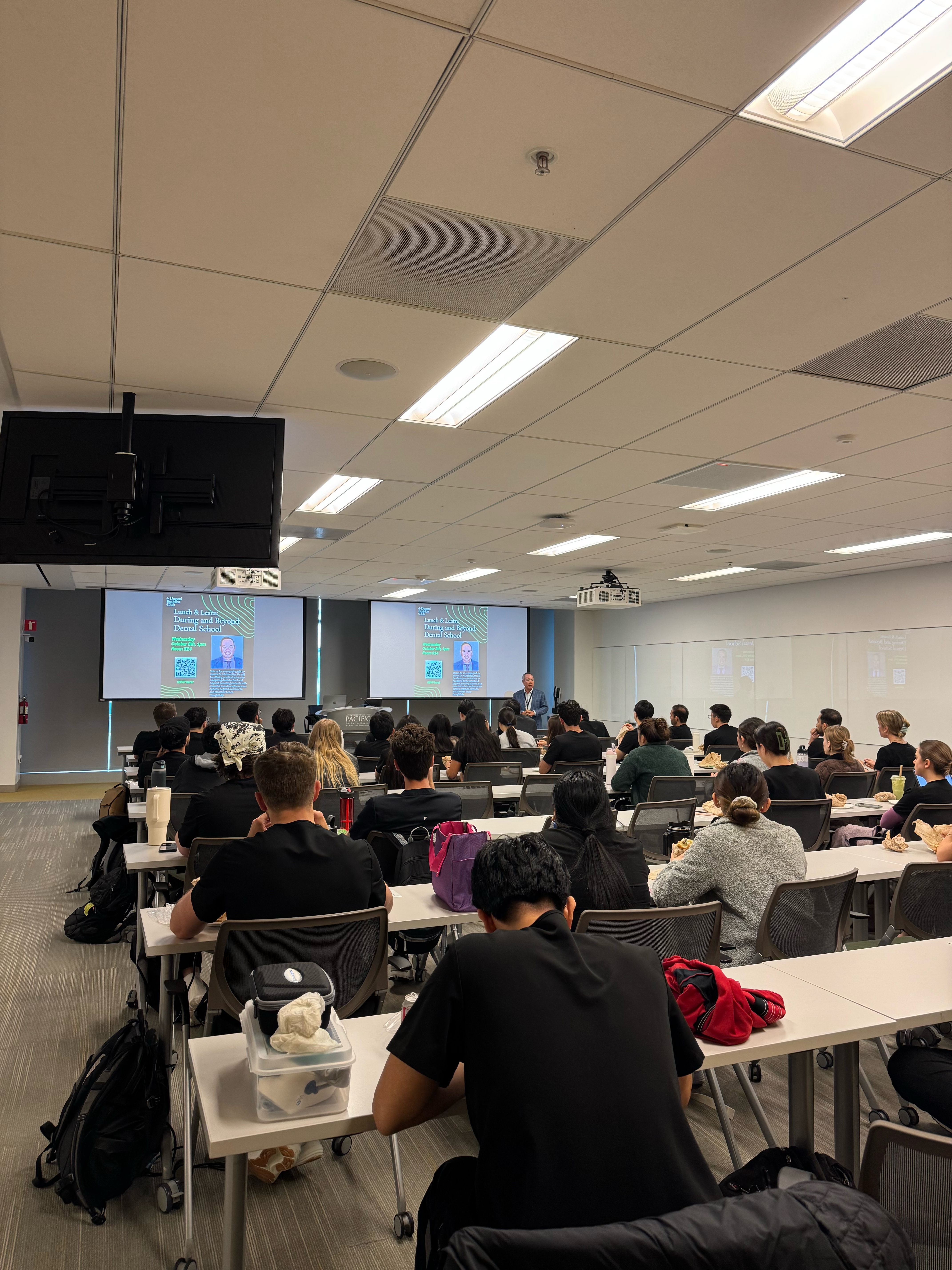 Dr. Michael Njo presenting to Dugoni students during the Lunch & Learn session