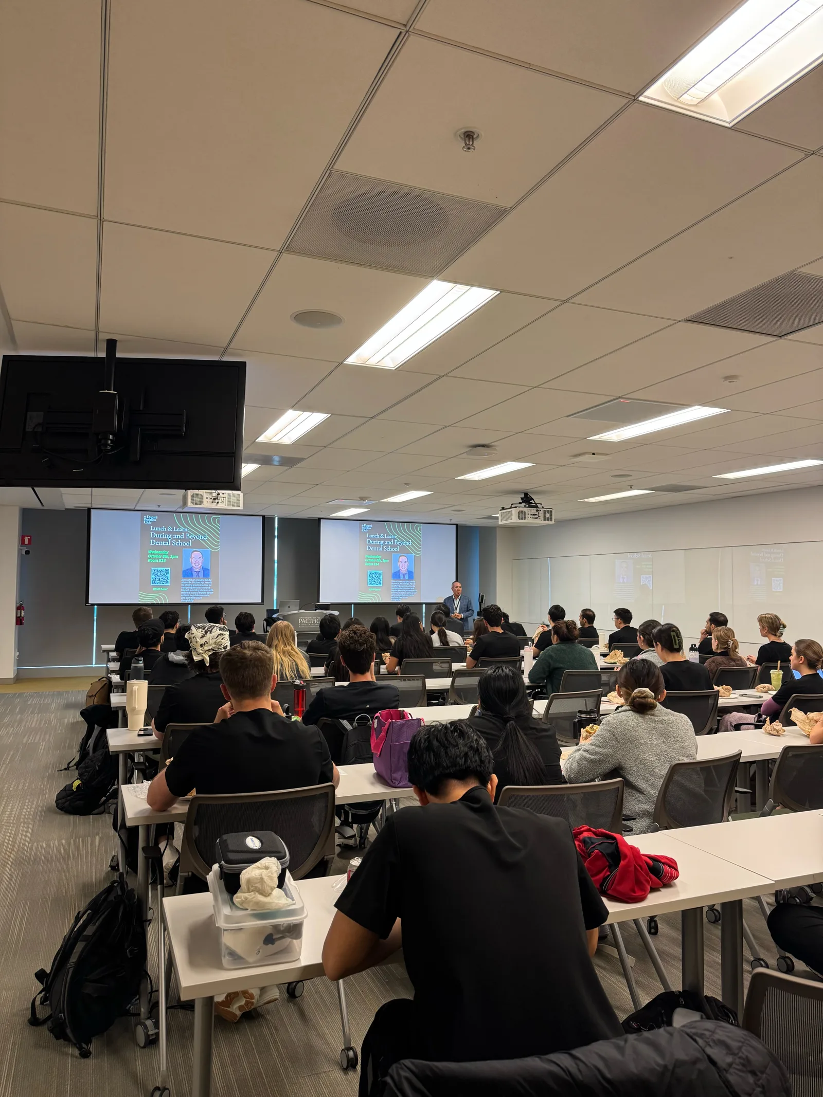 Dr. Michael Njo presenting to Dugoni students during the Lunch & Learn session